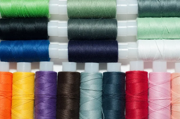 stock image Group of multicolored sewing threads