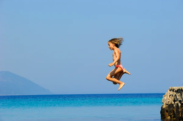 stock image Girl Jumping to Sea