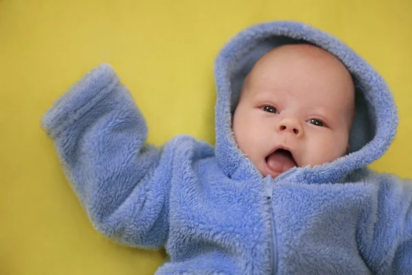 Cheerful Baby Blue Overalls Yellow Background Small Depth Sharpness — Stock Photo, Image