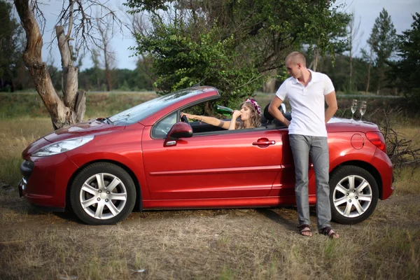 stock image Car, girl, champagne