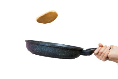 Flipping a pancake. clipart