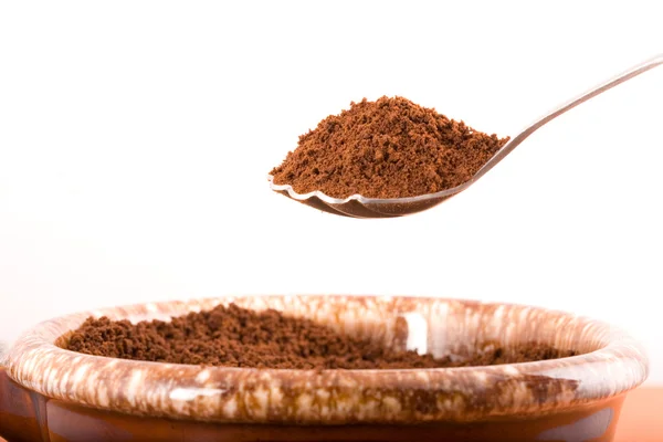Coffee grounds on a spoon. — Stock Photo, Image