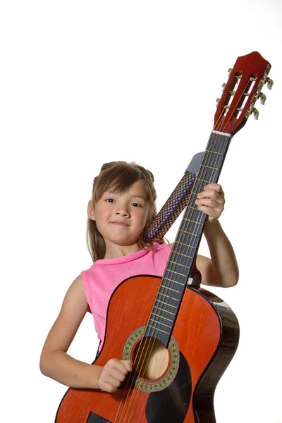 Genç Bir Kız Bir Gitar Stüdyo Fotoğraf Tutar — Stok fotoğraf