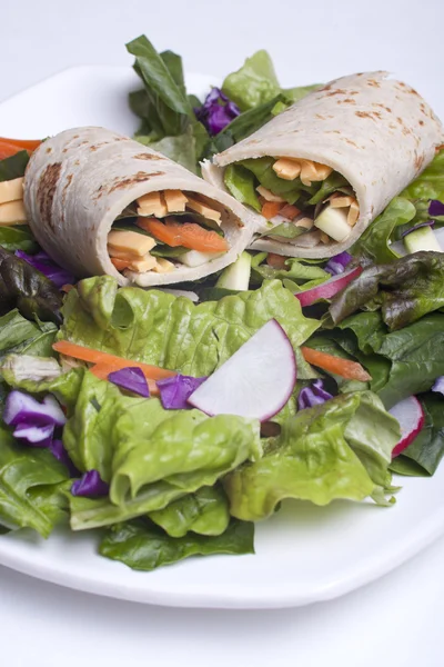 Veggie wrap and a salad.