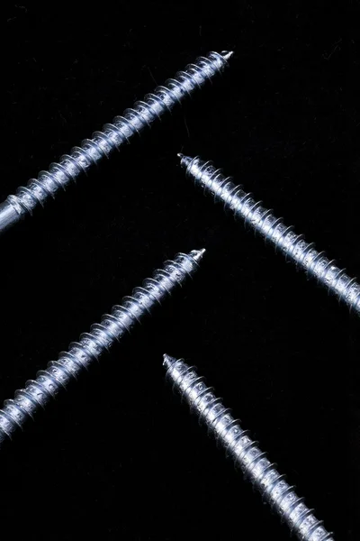 Pattern of shiny screws. — Stock Photo, Image