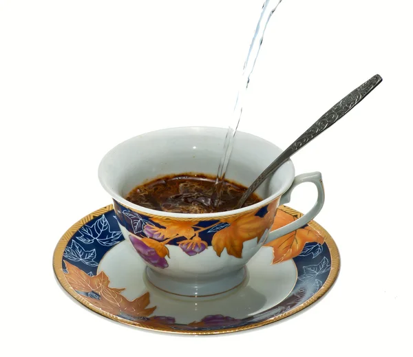 stock image To fill the coffee and sugar in a white Cup is isolated