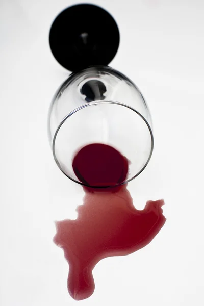 Red Wine Has Been Split Knocked Wine Glass White Table — Stock Photo, Image