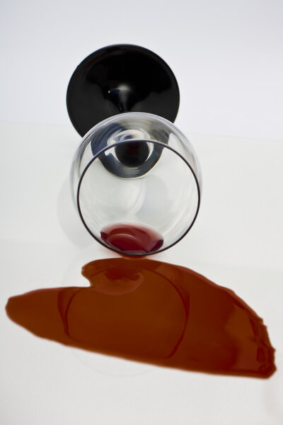 Spilled red wine in heart shape