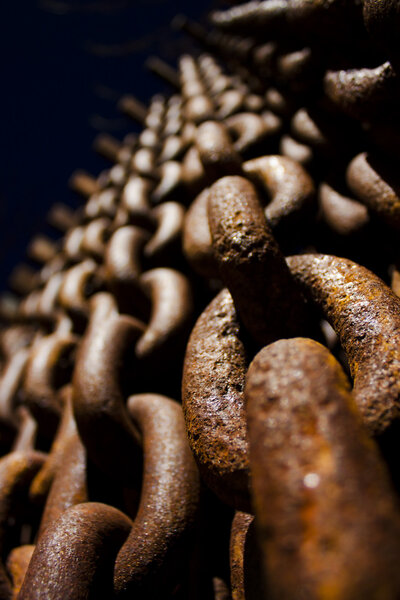 A sculpture of rusty old chains