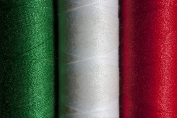 stock image Italian flag in the reels of cotton