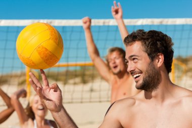 Man playing beach volleyball clipart