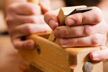 Carpenter working with a clipart