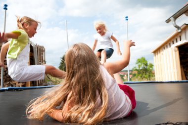 Three children jumping on a clipart