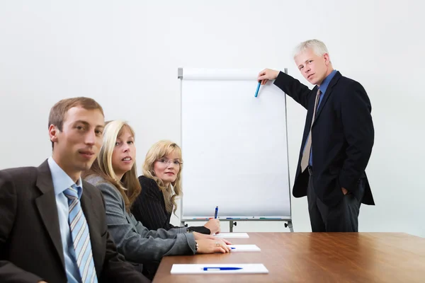Businessman presenting at the — Stock Photo, Image