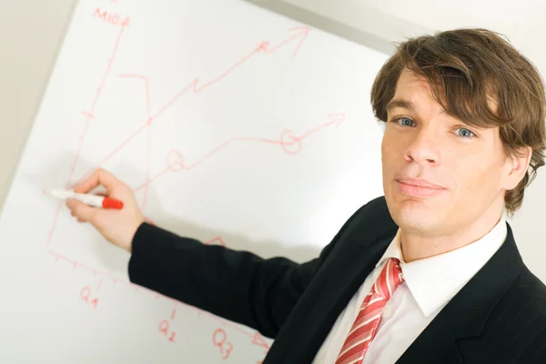 Businessman presenting at the — Stock Photo, Image