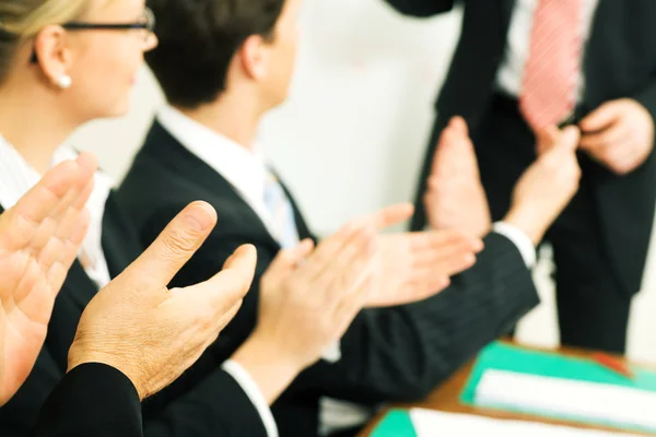 stock image Business team applauding after