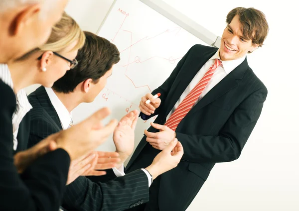 Business team applauding after — Stock Photo, Image