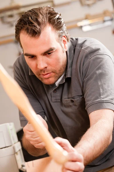 Carpenter working on a hand — Stock Photo, Image