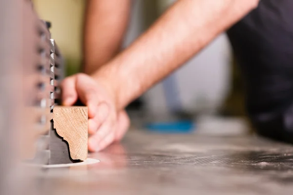 Carpenter is standing on — Stock Photo, Image