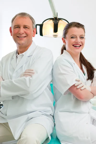 Dentists in their surgery — Stock Photo, Image