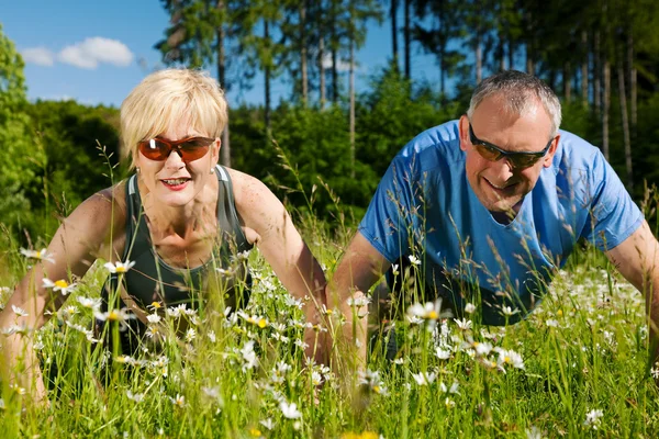 Mature or senior couple doing — Stock Photo, Image