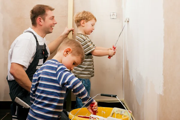 Stock image Father and son measuring a dry