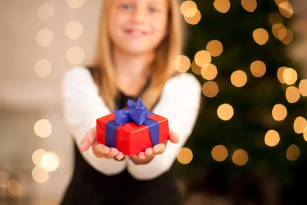 Girl in front of a Christmas tree — Stock Photo, Image