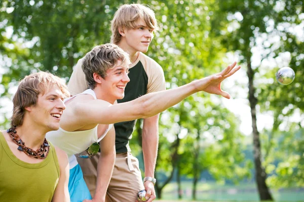 Group of young men playing — Stock Photo, Image