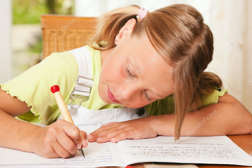 Girl preparing her homework