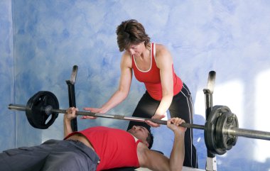 Man lifting a barbell being clipart