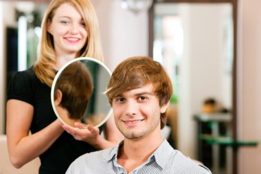 Man at the hairdresser, she has clipart