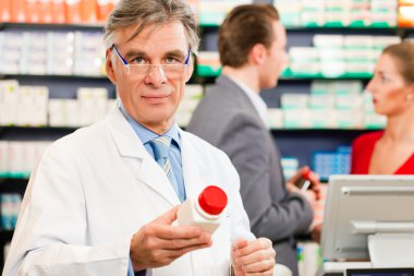 Pharmacist with customers in clipart