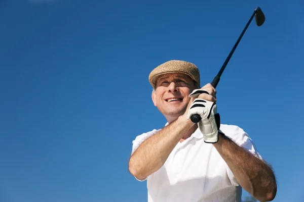 Senior golfista dělá golf — Stock fotografie