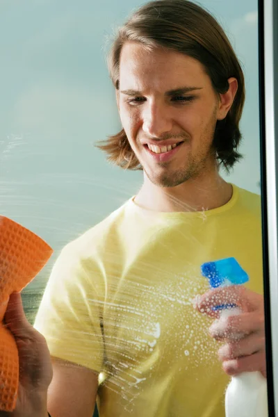 Young man cleaning his — Stock Photo, Image