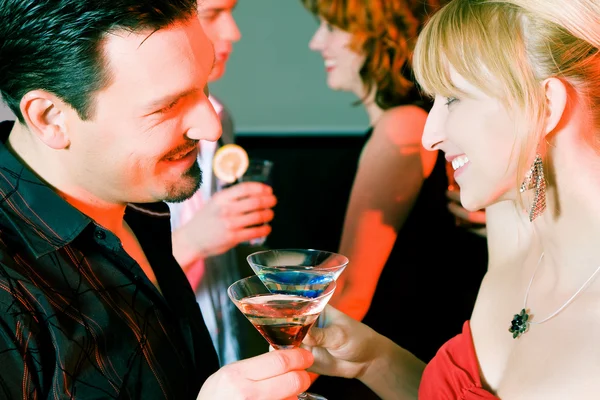 Couple flirting very obviously in — Stock Photo, Image