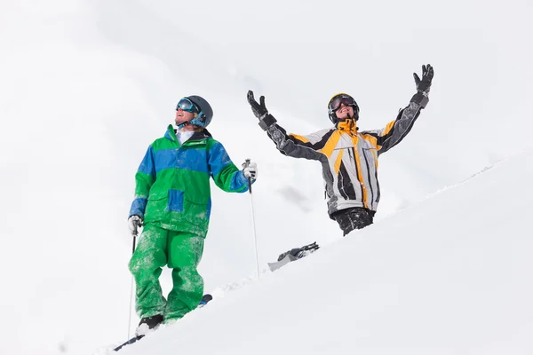 Skier and snowboarder in the — Stock Photo, Image