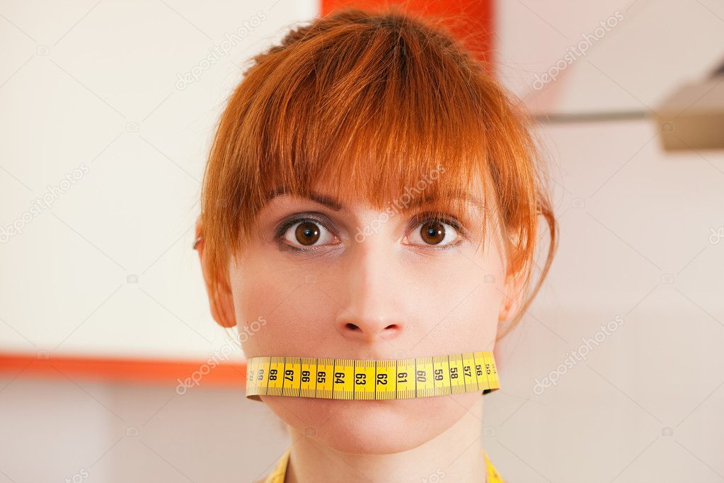 Woman gagged by a tape