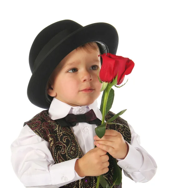红玫瑰的小男孩 — 图库照片