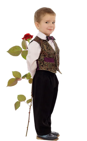 Улыбающийся Мальчик Прячет Розу Изолированную Белом — стоковое фото