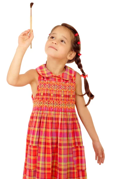 Kleines Mädchen mit einem Pinsel — Stockfoto