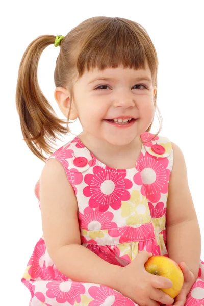 Lächelndes kleines Mädchen mit Apfel — Stockfoto