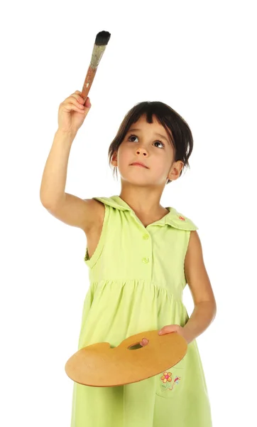 Маленькая девочка с кисточкой — стоковое фото