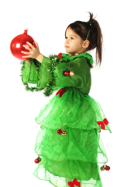 Piros karácsonyi dekoráció mosolygós kislány — Stock Fotó