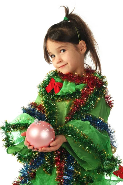 緑のクリスマス ツリーの衣装で少し微笑んでいる女の子 — ストック写真