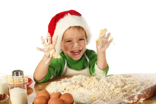 Liten pojke matlagning jul tårta — Stockfoto