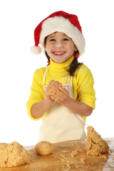 Little girl cooking the Christmas cake — Stock Photo, Image