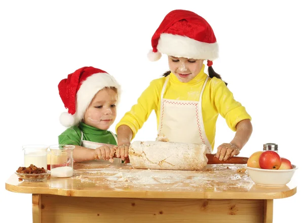 Little children cooking the Christmas cake — Stock Photo, Image