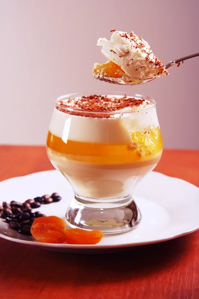 Spoon with multilayer gelatin dessert — Stock Photo, Image