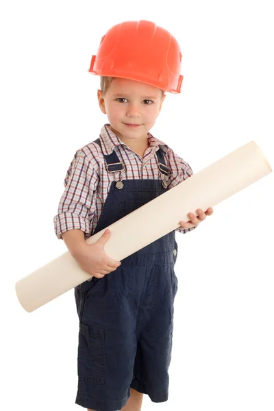 Little builder in coveralls and helmet with blueprint — Stock Photo, Image