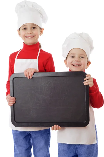 Little cookers with empty horizontal chalkboard — Stock Photo, Image